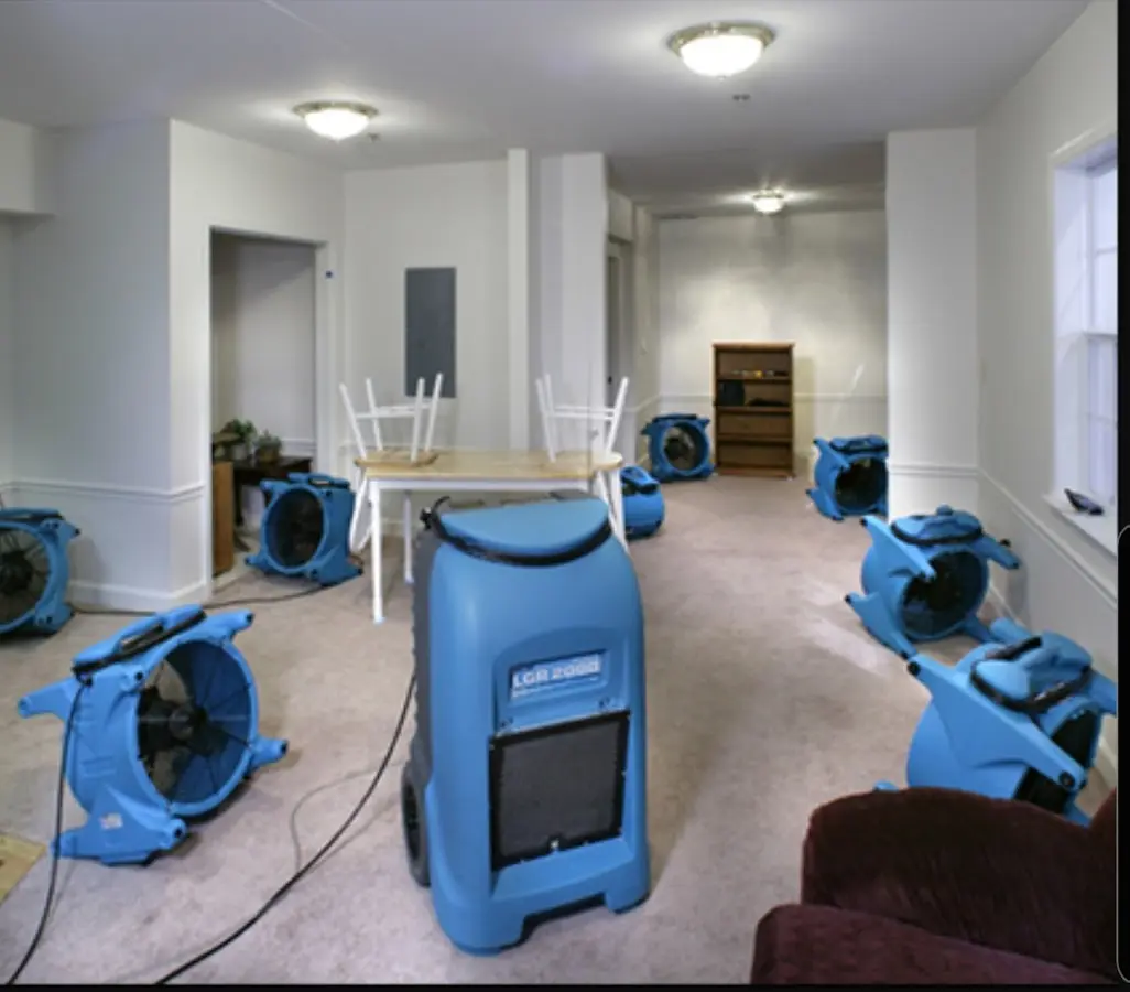 Air movers and dehumidifier setup for Water Damage Restoration in Marlborough